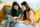 Two young women relaxing on the couch