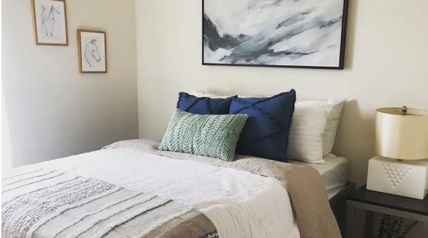 a furnished student apartment bedroom
