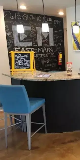 leasing office with a chalkboard wall